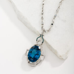 London blue topaz necklace with blue & white diamonds