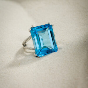 Blue topaz ring with  white diamonds
